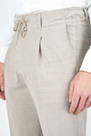Pantaloni in lana bi-stretch con coulisse