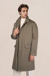 Waxed wool raincoat with leather undercollar