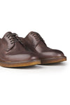 Derby in Pelle Butter