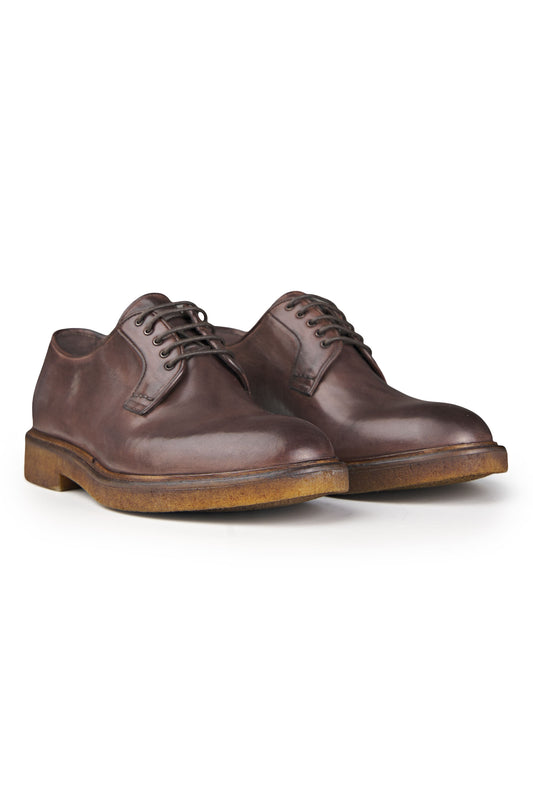 Derby in Pelle Butter